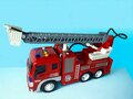 Camion de pompier - Moteur &agrave; friction - Tuyau de pulv&eacute;risation et camion &eacute;chelle - avec son et lumi&egrave;res - 27,5 cm